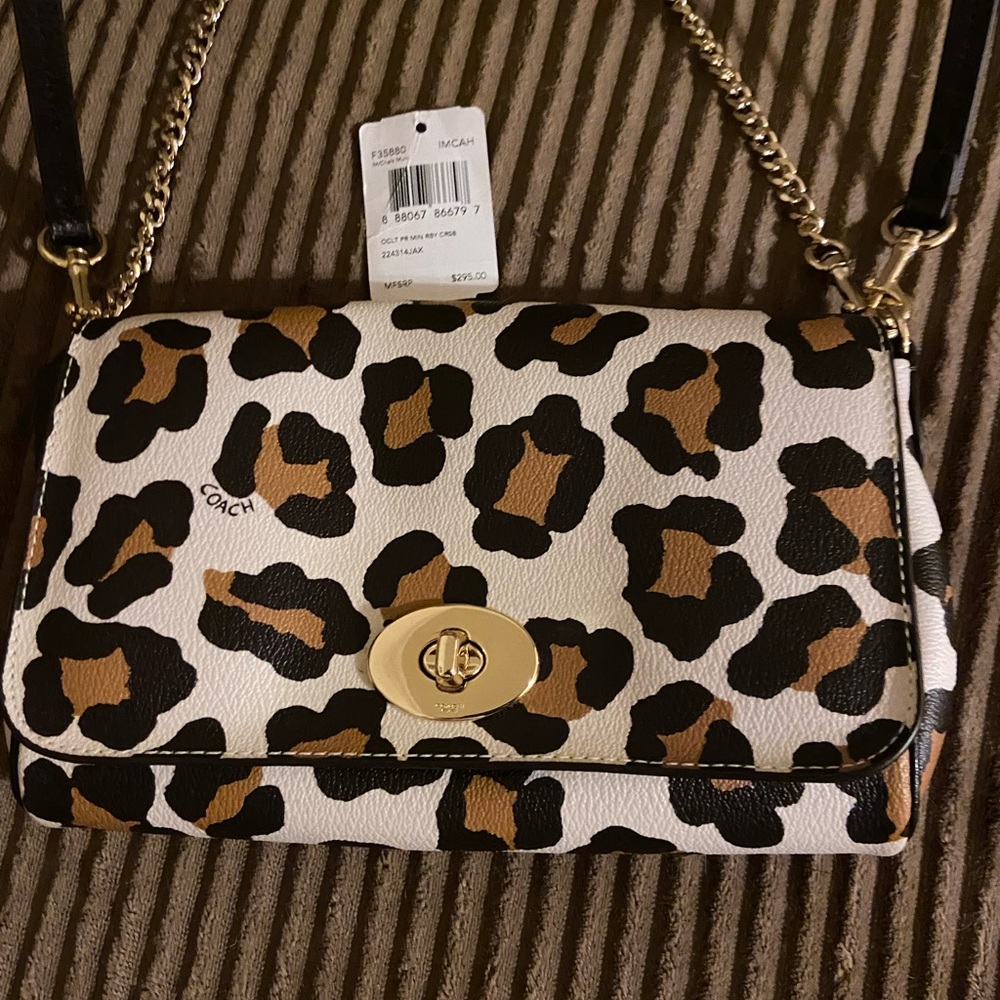 Beautiful animal print purse, versatile w/care instructions.